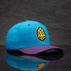 Boné Aba Curva Crossover Turquesa e Roxo Texo